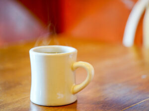 Pour Another Cup: Celebrating National Coffee Day at Squeeze In